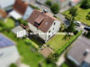 Freistehendes Ein-/Zweifamilienhaus mit schönem Grundstück und Garage in Niederwerrn - Drohnenaufnahme