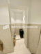 Sanierte Zwei-Zimmer-Wohnung mit EBK in zentraler Innenstadtlage - Waschmaschinenstellplatz im Badezimmer