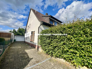 Doppelhaushälfte mit Doppelgarage auf großem Grundstück in Geldersheim, 97505 Geldersheim, Haus