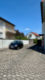 Erdgeschoss Zwei-Zimmer-Wohnung mit Terrasse und Stellplatz - Stellplatz