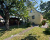 Reserviert. Freistehendes Einfamilienhaus mit Garage auf großem Grundstück - Außenansicht