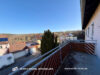 Zweifamilienhaus mit Einzimmer-Wohnung im Dachgeschoss und 2 Garagen in Schonungen - Balkon OG