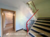 Zweifamilienhaus mit Einzimmer-Wohnung im Dachgeschoss und 2 Garagen in Schonungen - Treppenhaus EG