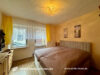 Einfamilienhaus mit Nebengebäude und Scheune in Waigolshausen OT Hergolshausen - Schlafzimmer EG