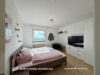 Ansprechende 3-Zimmer-Wohnung mit Aufzug & schönem Ausblick am Schweinfurter Stadtrand - Schlafzimmer