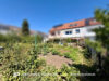 Geräumiges Reihenmittelhaus mit sieben Zimmern und Garage in Niederwerrn - Außenansicht