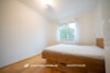 Energie A | Barrierefreie Drei-Zimmer-Wohnung mit Balkon, Garage und zwei Stellplätzen | Bj. 2016 - Schlafzimmer